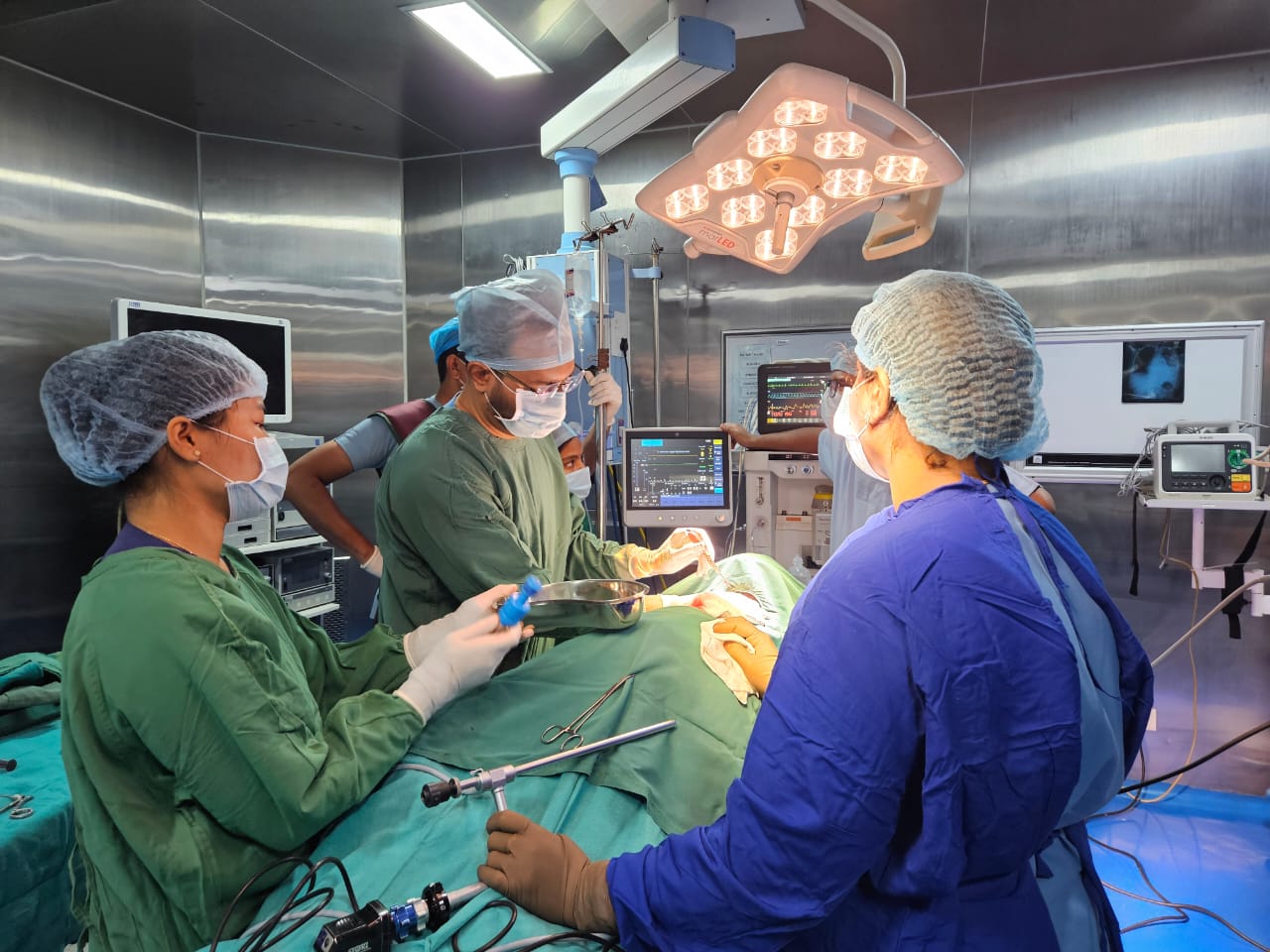 Dr. Faizan Aziz and the clinical team in the procedure suite